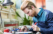 Man fixing electronic